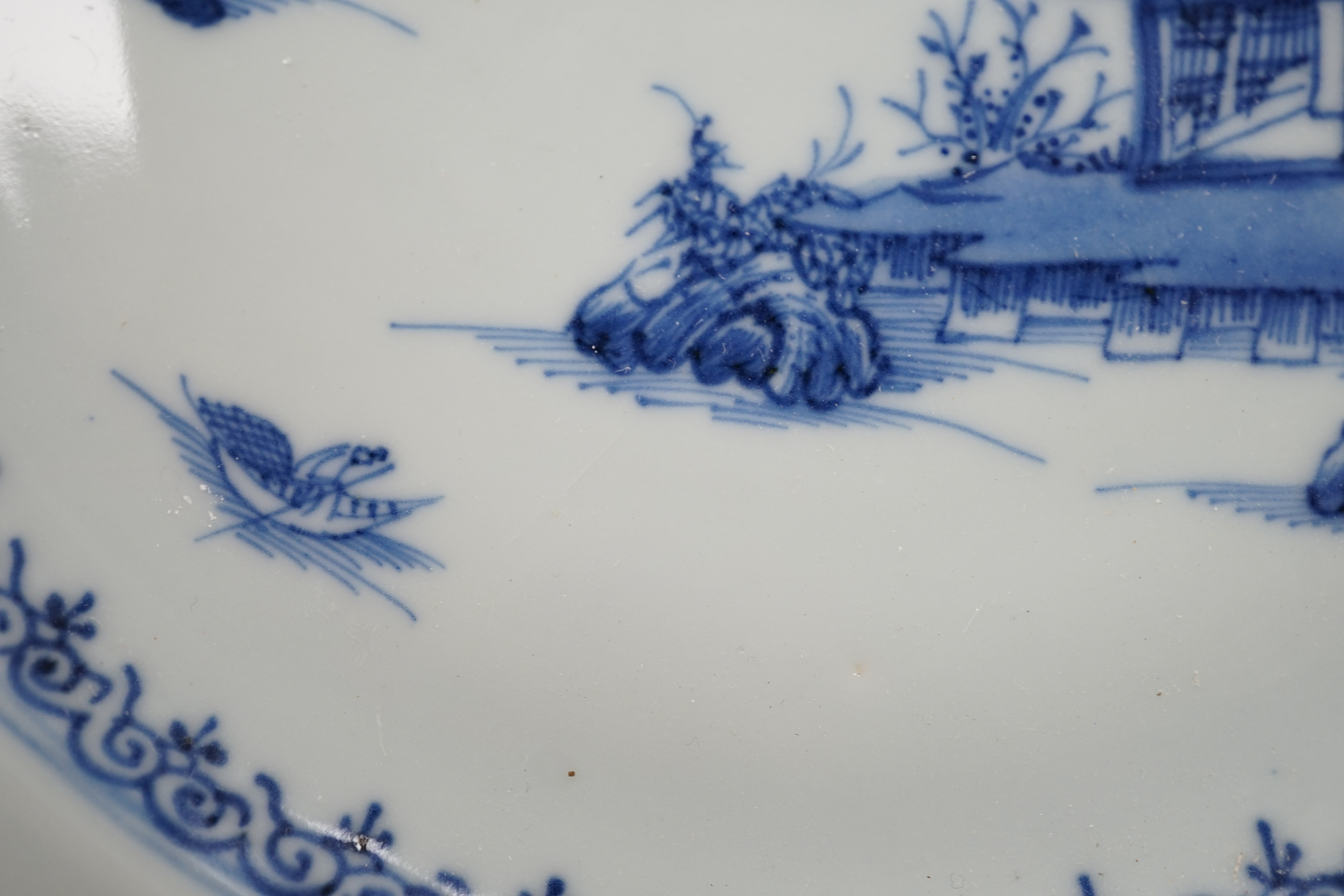 A set of twelve Chinese Nanking Cargo ‘Boatman’ blue and white plates, Qianlong period